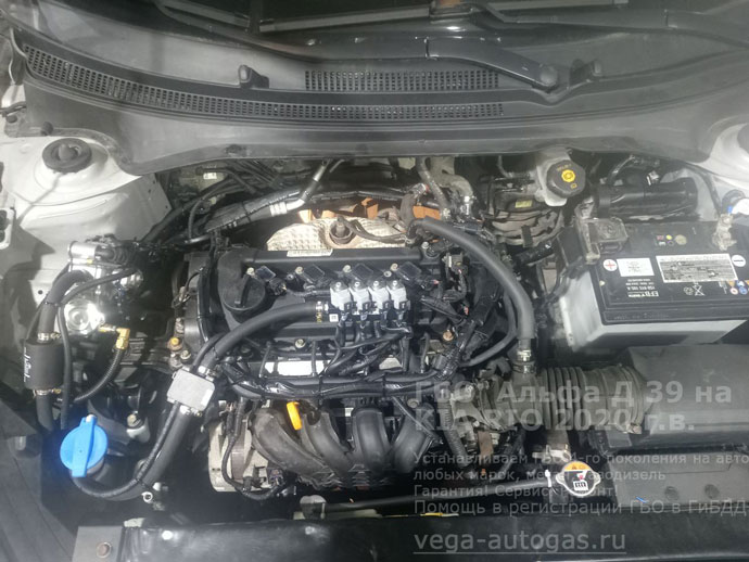 подкапотная компоновка, установка ГБО Альфа Д39 на Киа Рио 2020 г.в., 1.4 л, 99 л.с., с пробегом 162 424 км., ВЗУ в заднем бампере, со стороны лючка бензобака, тороидальный баллон 54 литра в багажнике, в нише для запасного колеса, Нижний Новгород, Дзержинск